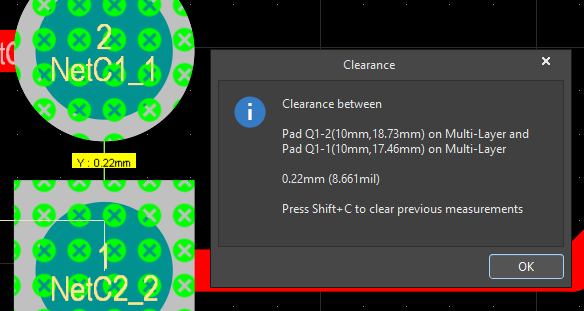 Measuring the distance between the edges of adjacent pads using the Measure Primitives command.